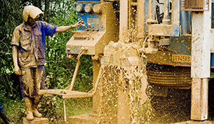 Crews dig a well in Rwanda